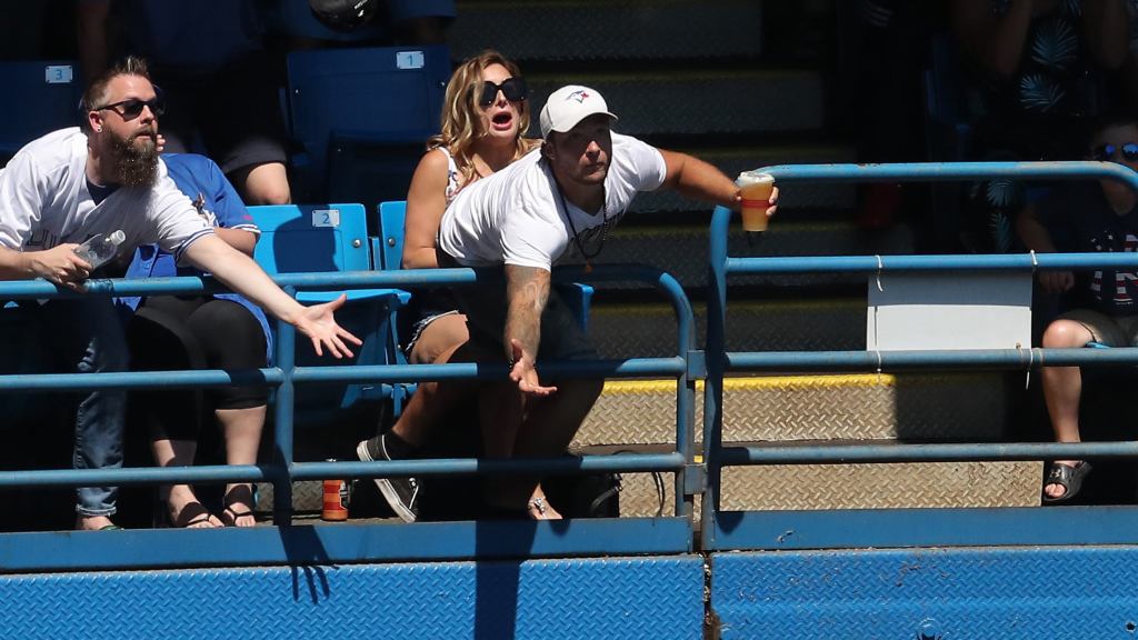 So-Called Diehard Fan Won’t Even Leap Over Stadium Railing To Catch T-Shirt