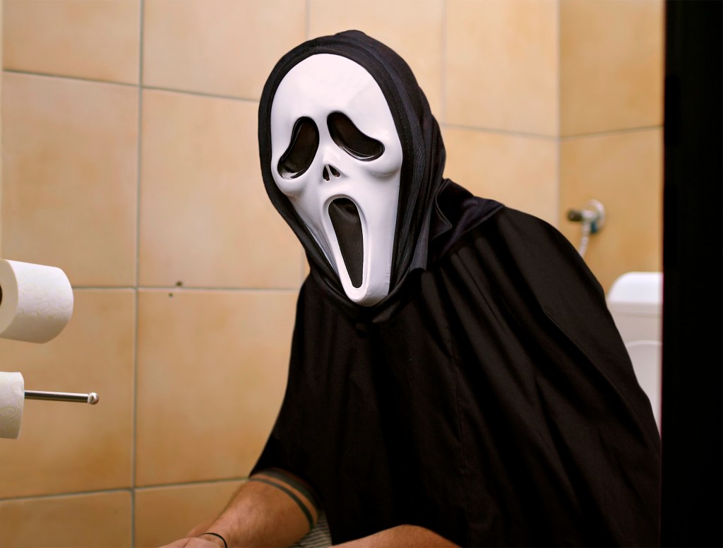 Scream Mask Left On While Using Toilet