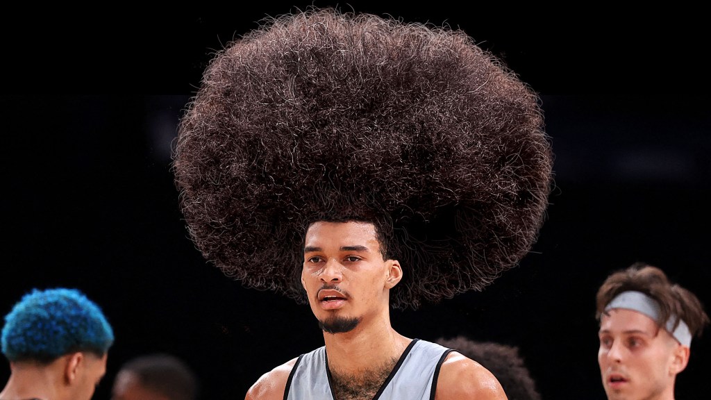 Victor Wembanyama Reports To Training Camp Having Added 25 Pounds Of Hair